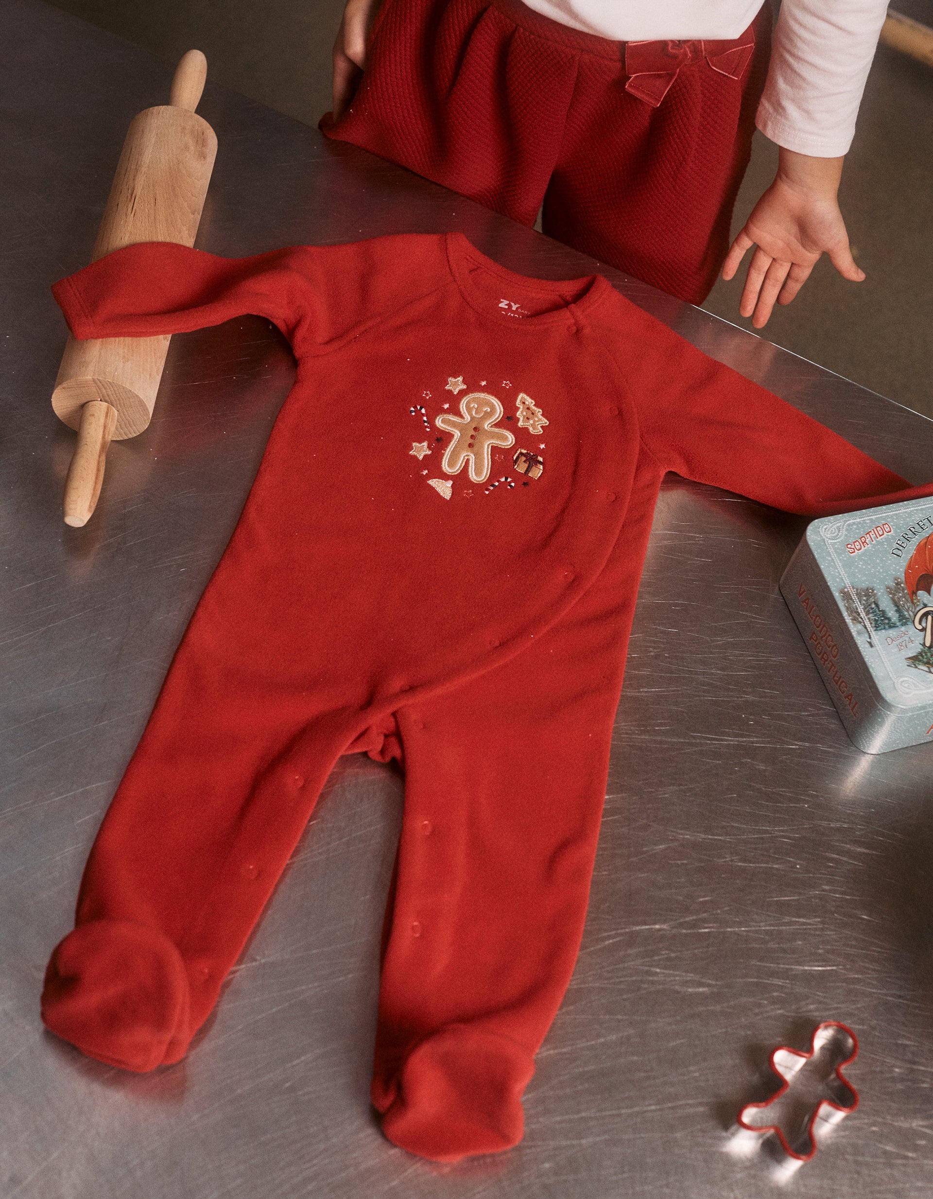 Polar fleece babygrow with embroidery for newborns and babies, red