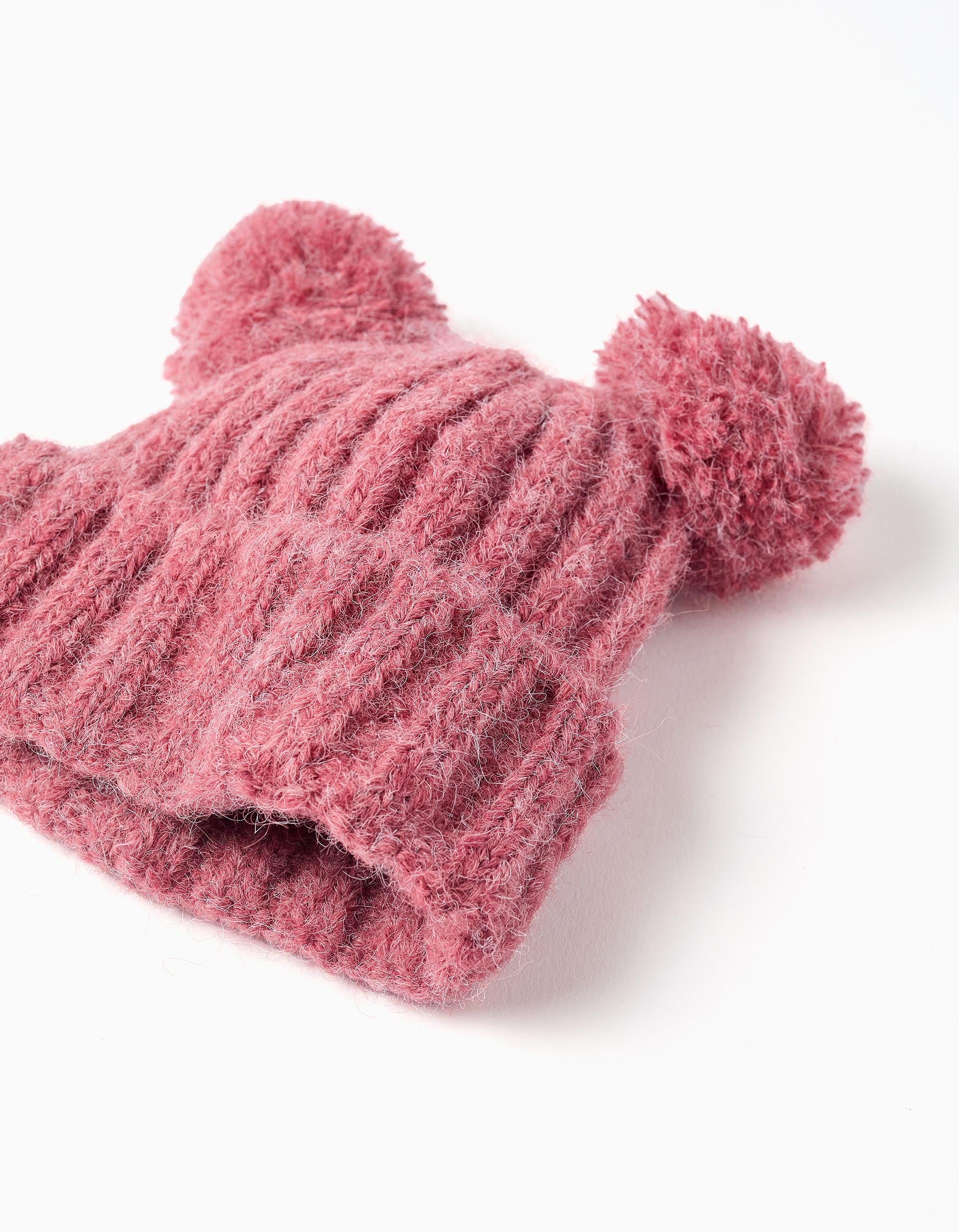 Thick cable knit beanie with pompoms for baby girls, pink