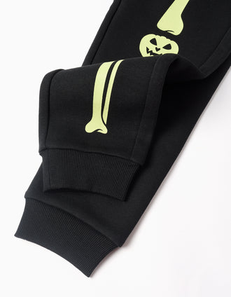Joggers cardados com estampado que brilha no escuro para menino, preto