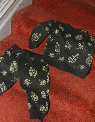 Conjunto cardado com motivo brilha no escuro para bebé menino, preto