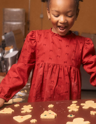 Vestido de sarga con motivo de lazos de terciopelo para niña, rojo