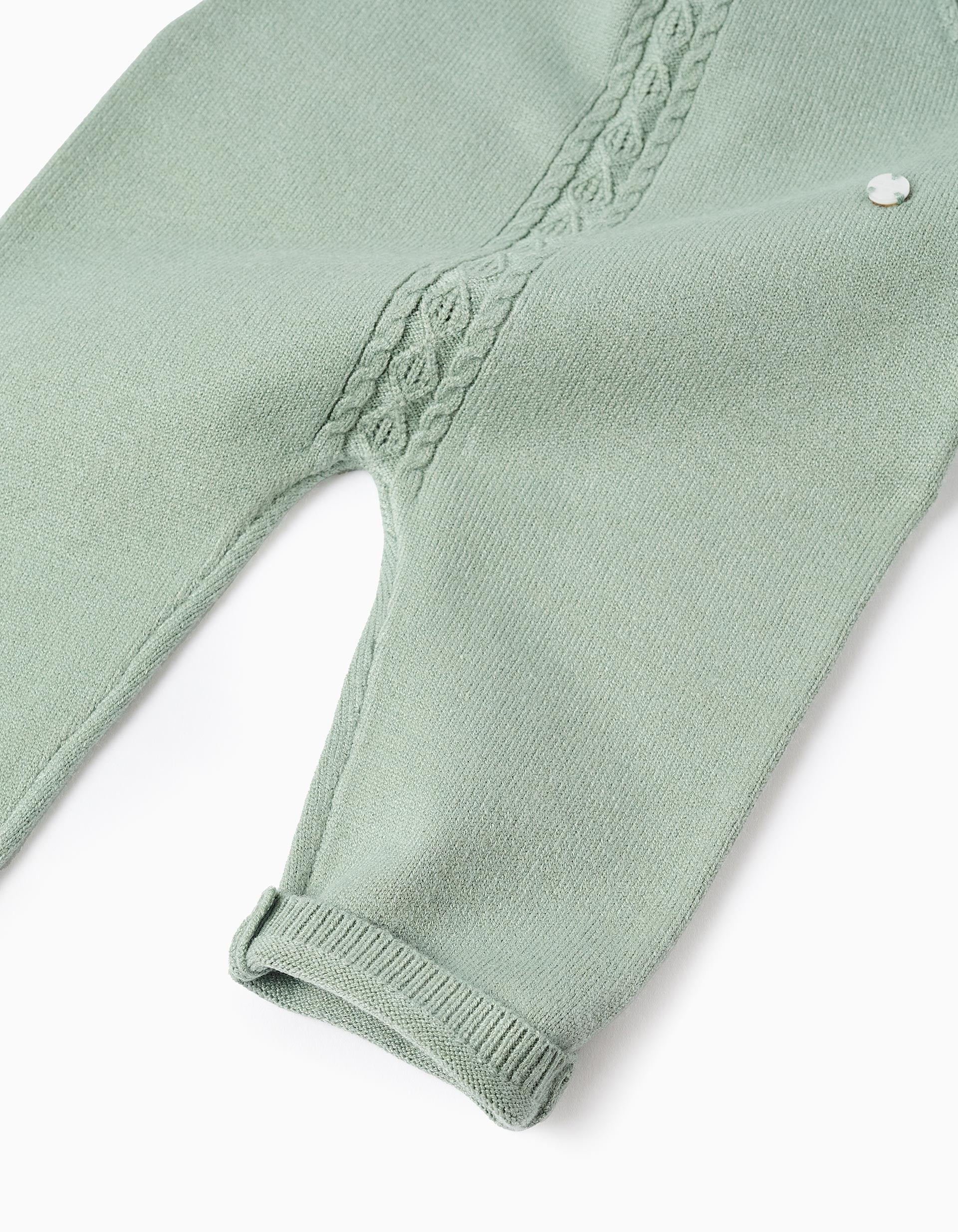 Knitted jumpsuit with ruffles for newborn girls, light green