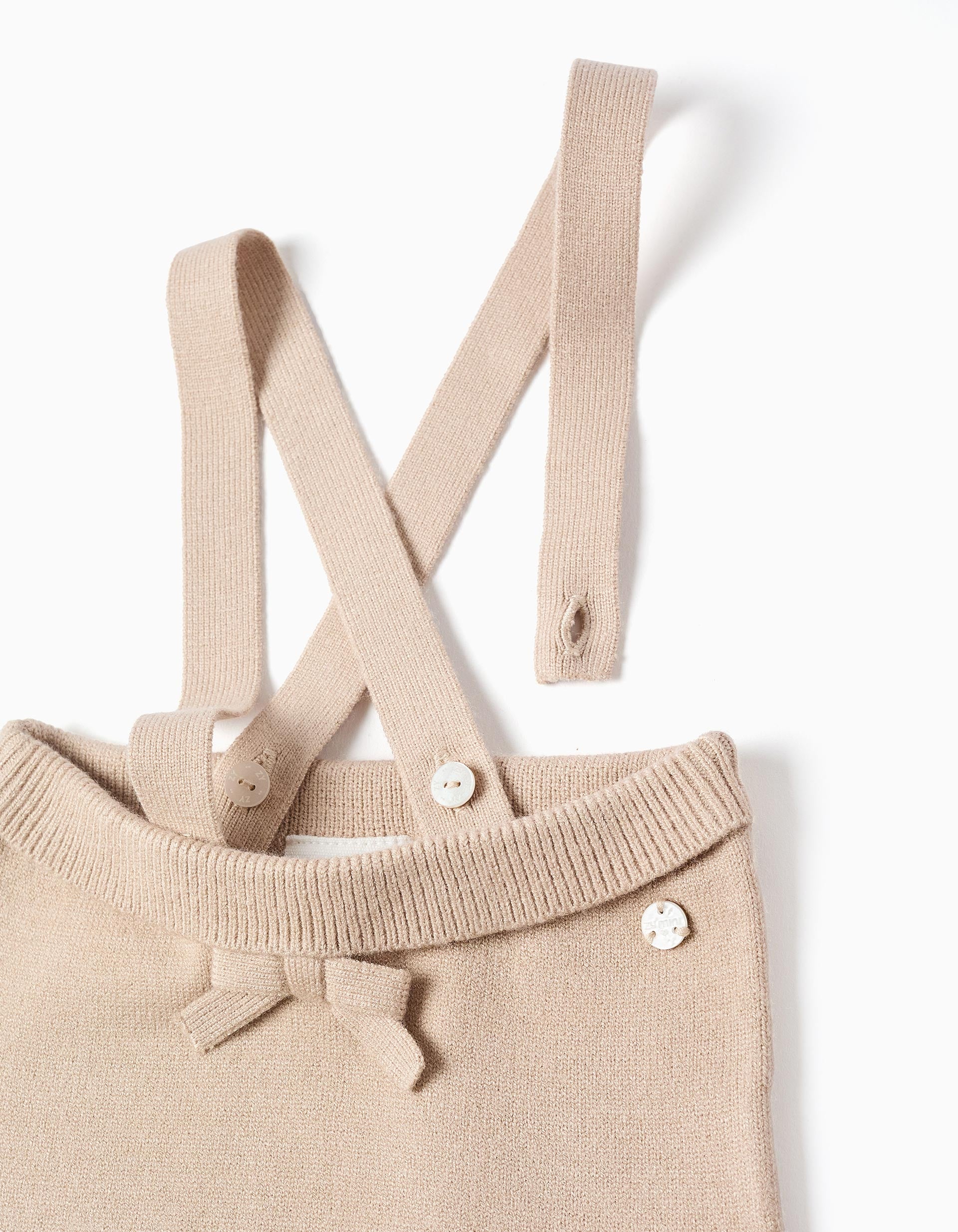 Calças de malha com alças amovíveis para recém-nascida, bege