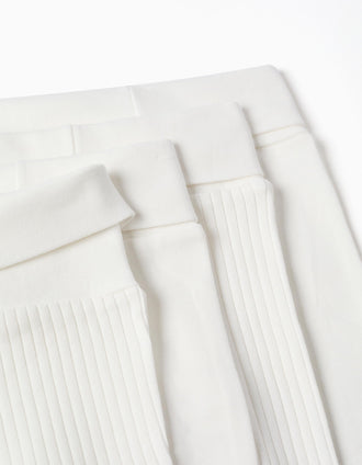 Pack de 4 calças lisas/caneladas de algodão para recém-nascidos, branco