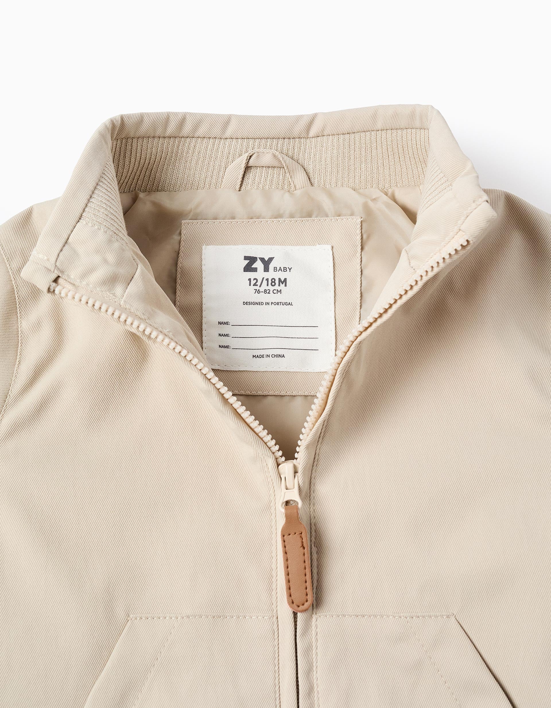 Veste avec doublure et capuche amovible pour bébé garçon, beige clair