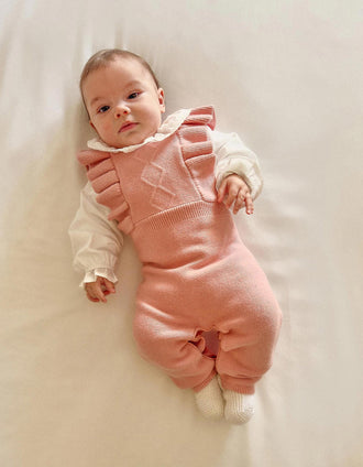 Knitted jumpsuit with ruffled straps for newborn girls, pink