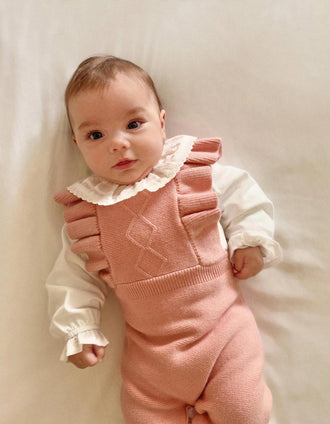Knitted jumpsuit with ruffled straps for newborn girls, pink