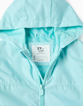 Hooded windbreaker with lining for baby girls, turquoise blue