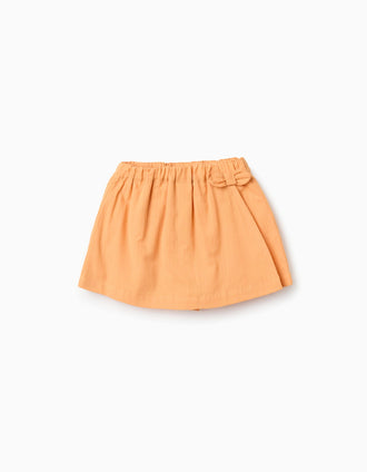 Cotton skort with decorative bow for baby girls, orange