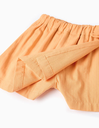 Cotton skort with decorative bow for baby girls, orange