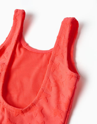 Swimsuit with star motif in bouclé for baby girls, neon coral