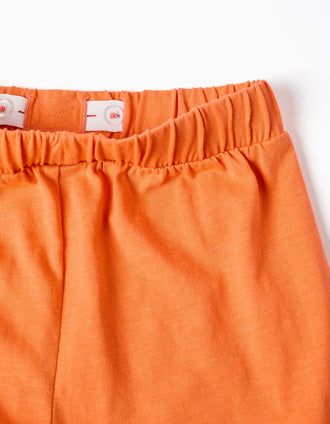 Cotton shorts with elastic waist and ruffles for girls, orange