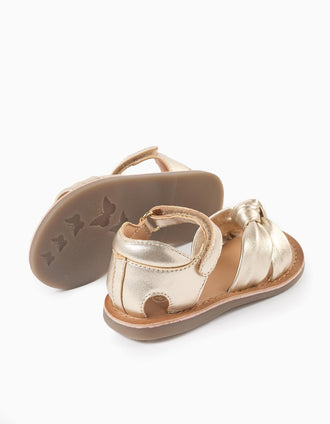 Leather sandals with decorative knot for baby girls, golden