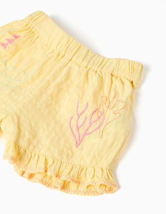 Cotton shorts with ruffles and embroidery for baby girls, yellow