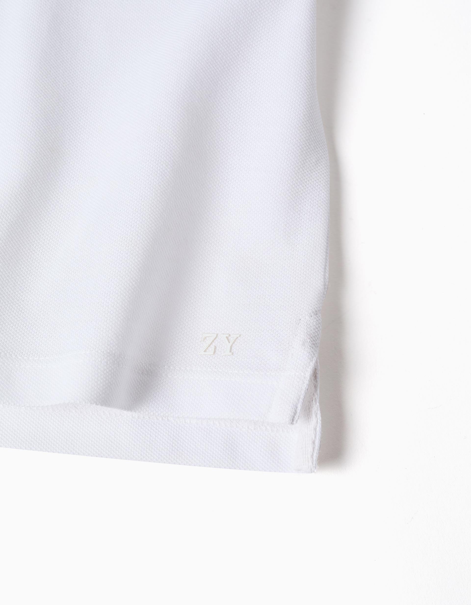 Polo de algodão com gola mao e bolso para bebé menino, branco