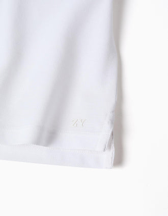 Polo de algodão com gola mao e bolso para bebé menino, branco
