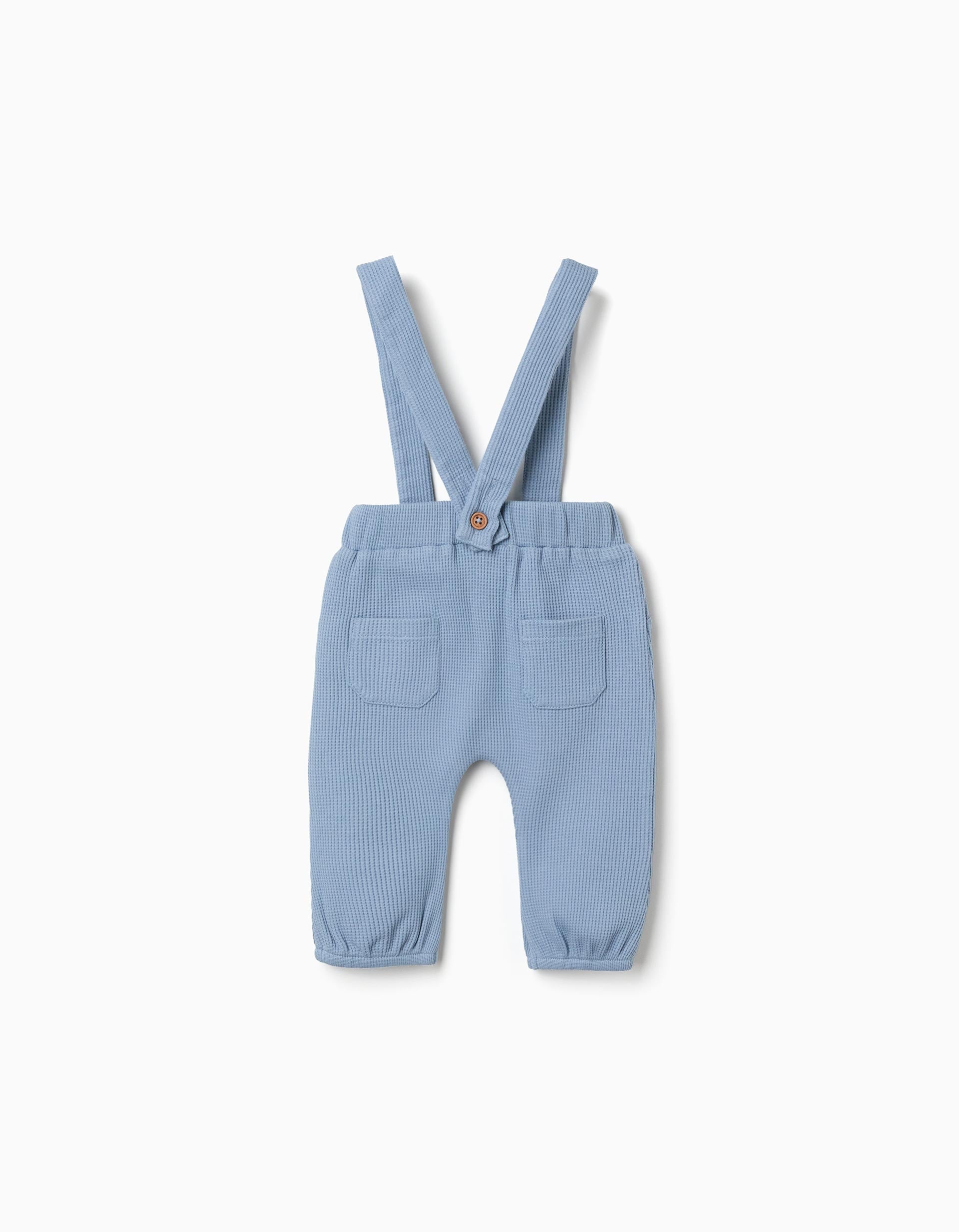 Waffle‑textured cotton trousers with straps for newborn boys, blue
