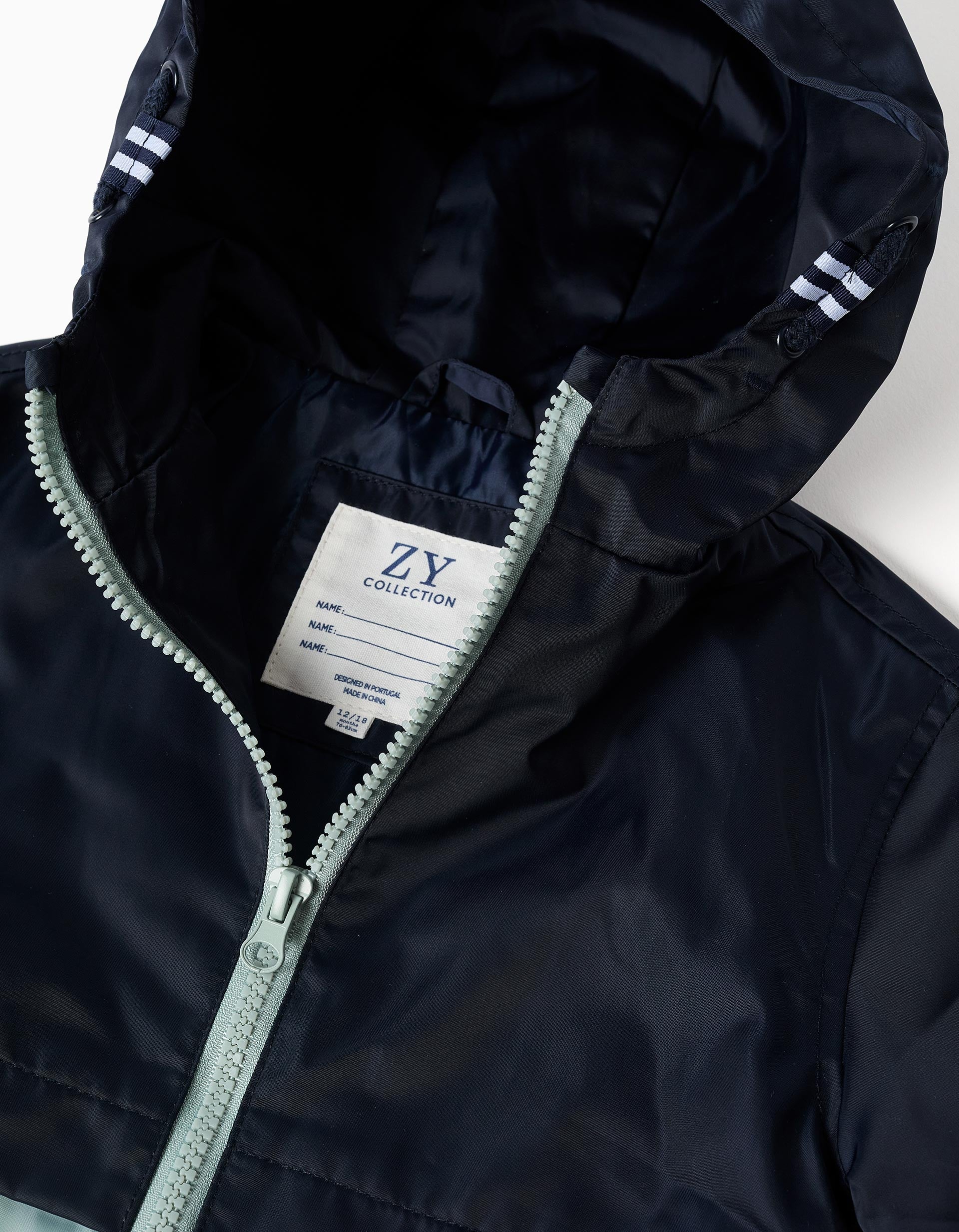 Coupe-vent à capuche et poches pour bébé garçon, bleu foncé/vert