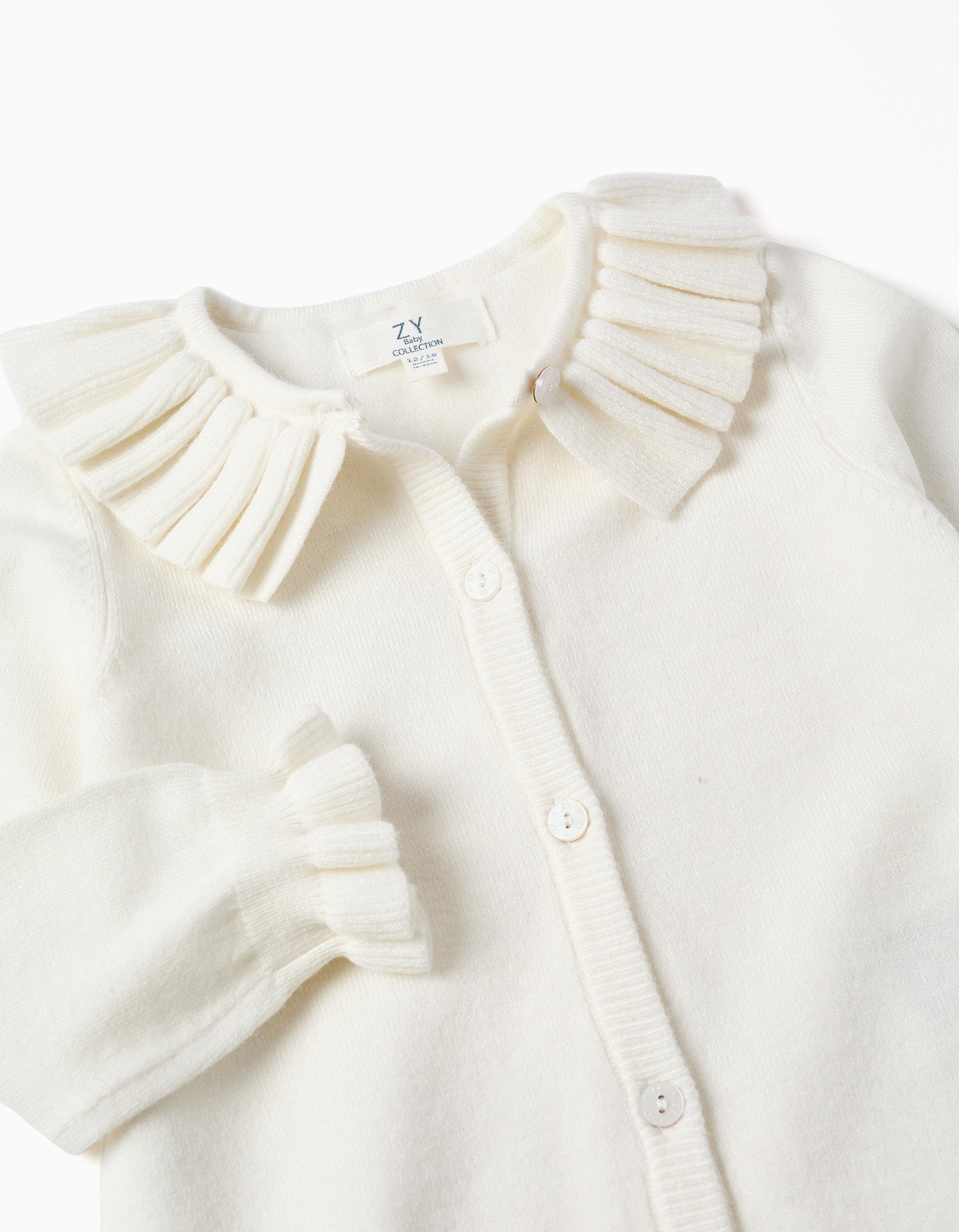 Knitted cardigan with ruffled collar and cuffs for baby girls, white