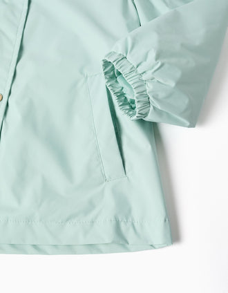Chaqueta cortavientos con capucha y volantes para niña, azul claro