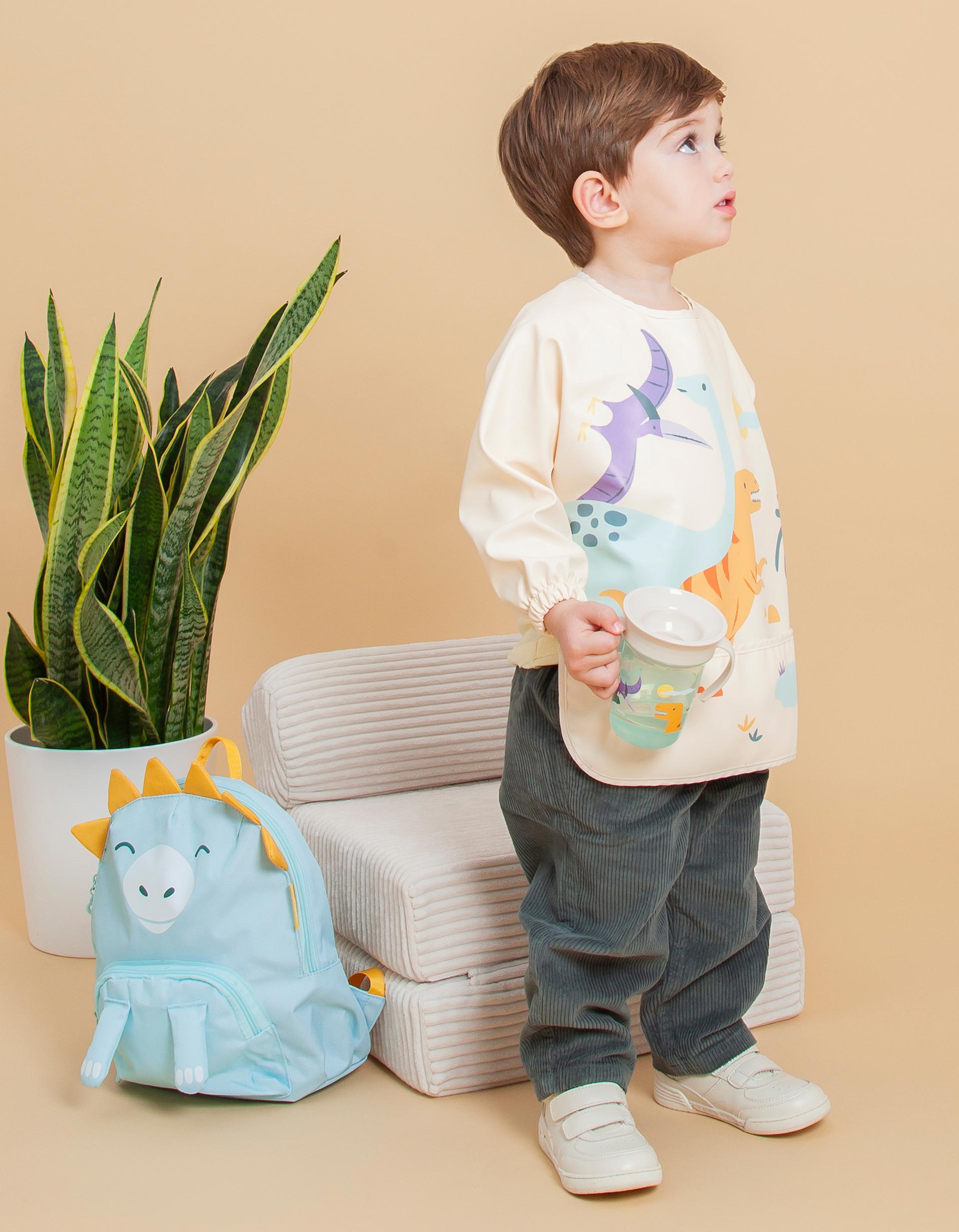 Jurassic Waterproof Soft Bib with Sleeves and Pocket by Miniland