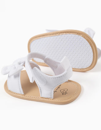 Sandals with open toe and decorative bow for newborn girls, white