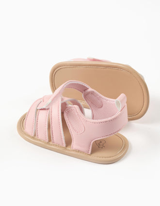 Sandalias con tiras cruzadas para recién nacida, rosa claro