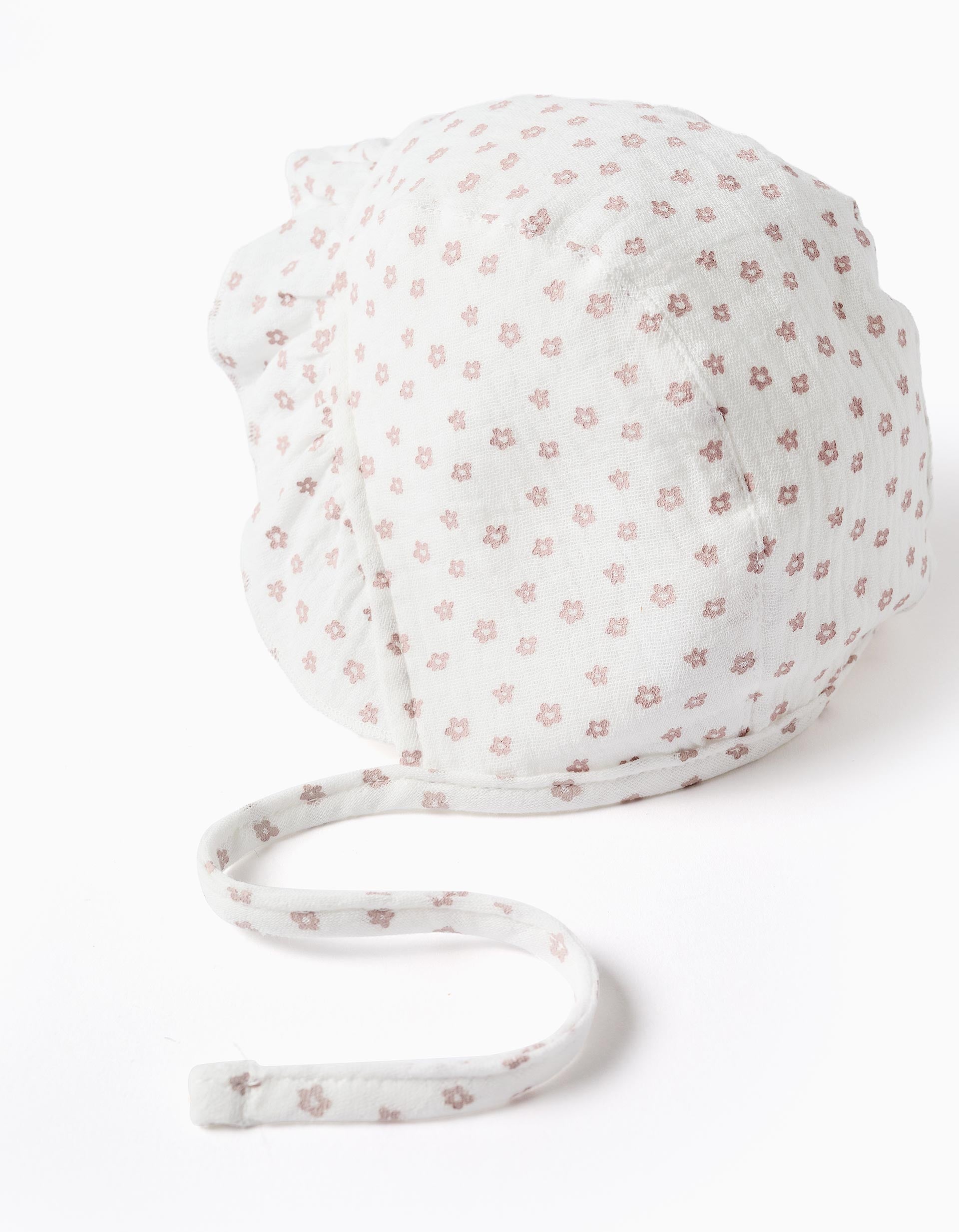 Touca de algodão com motivo floral e tiras para recém-nascida, branco