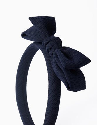 Bandolete acolchoada com laço decorativo para menina, azul-escuro