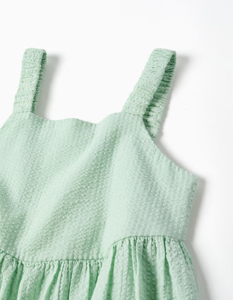 Sleeveless cotton dress with elastic straps for girls, light green
