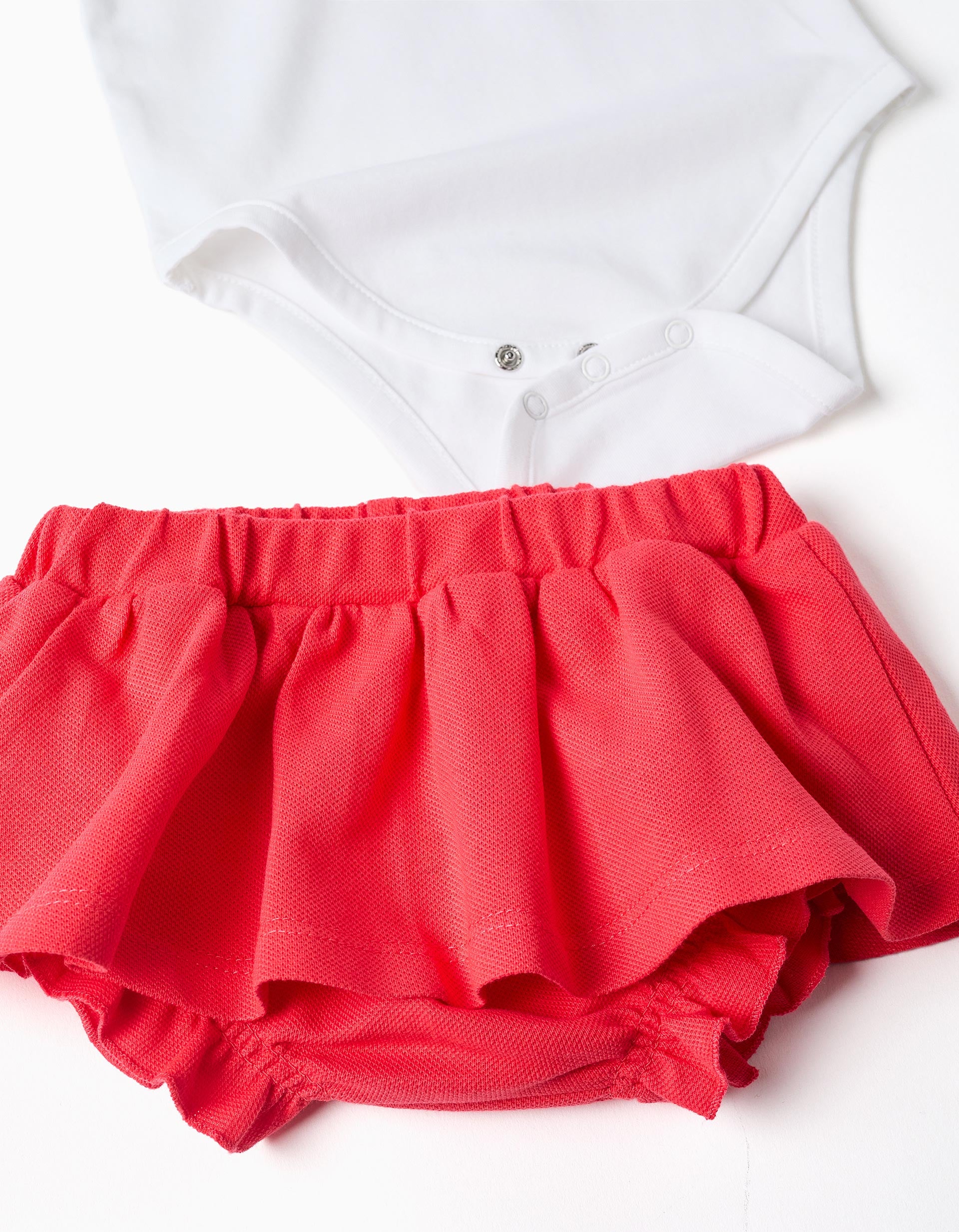 Body com estampado Minnie + saia para recém-nascida, branco/vermelho