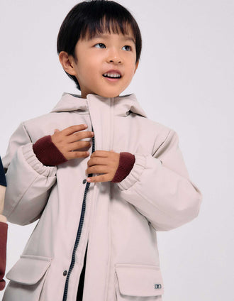 Hooded padded parka with front pockets for boys, light beige