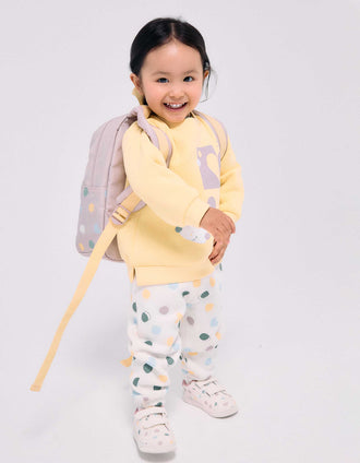 Brushed fleece trousers with dots pattern for baby girls, white