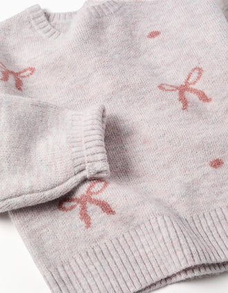 Knitted jumper with jacquard bows and dots for girls, light pink