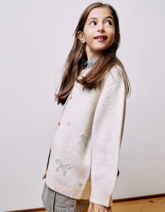 Knitted cardigan with jacquard bows and dots for girls, light beige