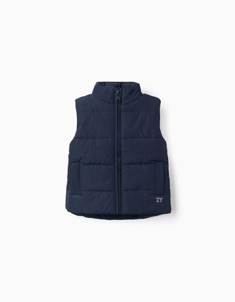 Padded vest with fleece lining and side pockets for babies, navy blue