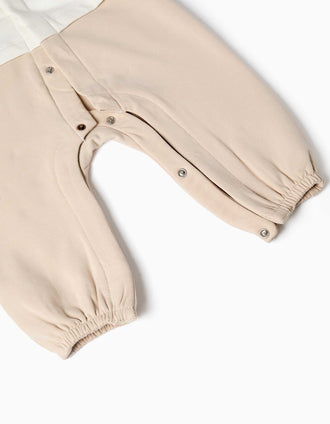 Footless sleepsuit with brushed interior for newborns, white/beige
