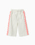 Striped cotton trousers with ric rac tape for baby girls, white/green