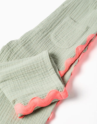 Cotton dungarees with ric rac tape for newborn and baby girls, green/coral