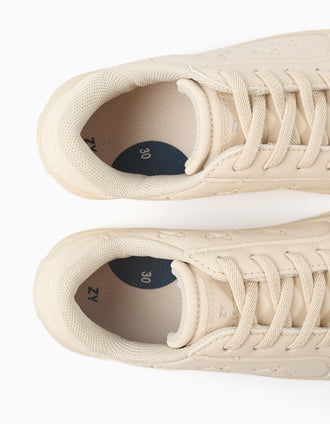 Trainers with embossed bows and elastic laces for girls, beige