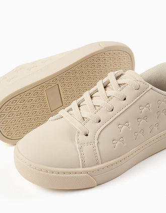 Trainers with embossed bows and elastic laces for girls, beige