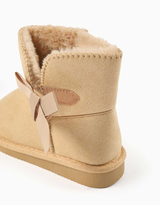 Ankle boots with plush lining and bow for baby girls, light beige