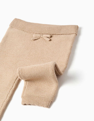 Knitted trousers with decorative bow for newborn girls, beige