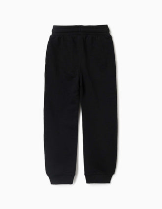 Pantalón deportivo con estampado que brilla en la oscuridad para niño, negro