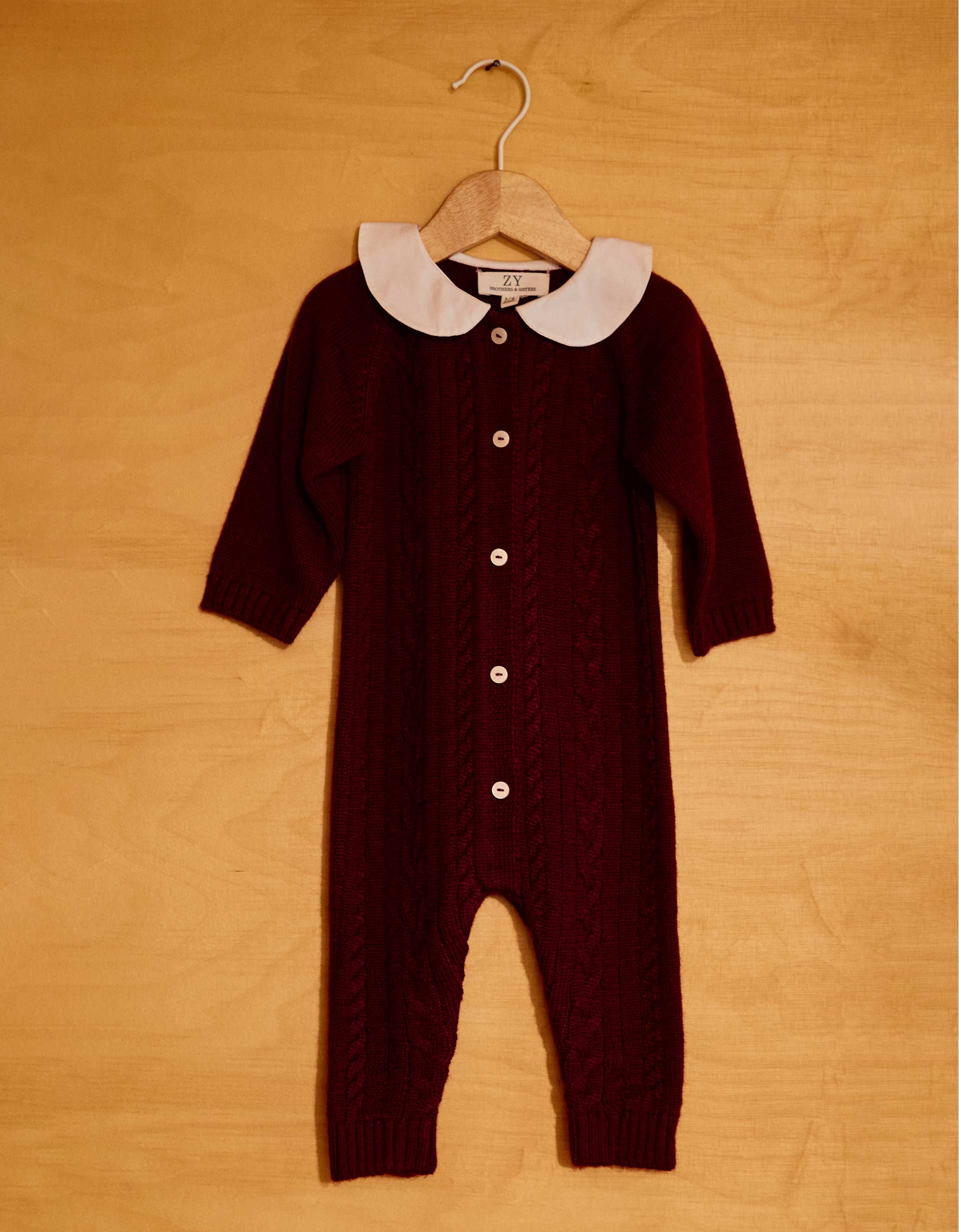 Long sleeve romper in a wool blend You&Me for newborn boys, dark red