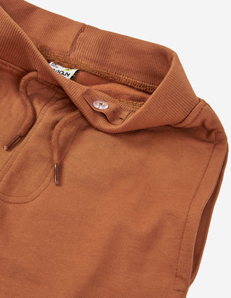 Joggers de algodão cardado com cordão funcional para menino, laranja