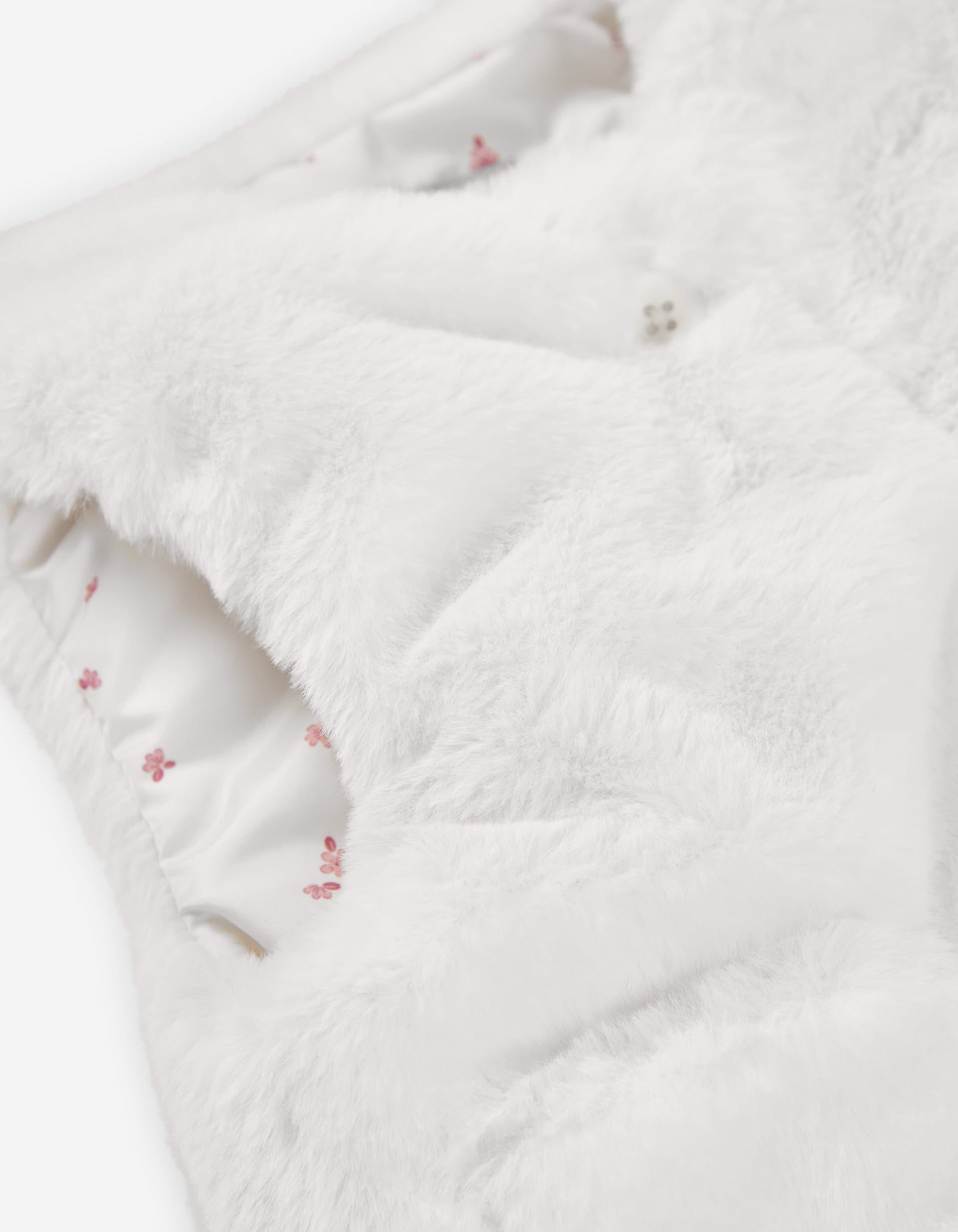 Faux fur vest with front pockets for baby girls, white